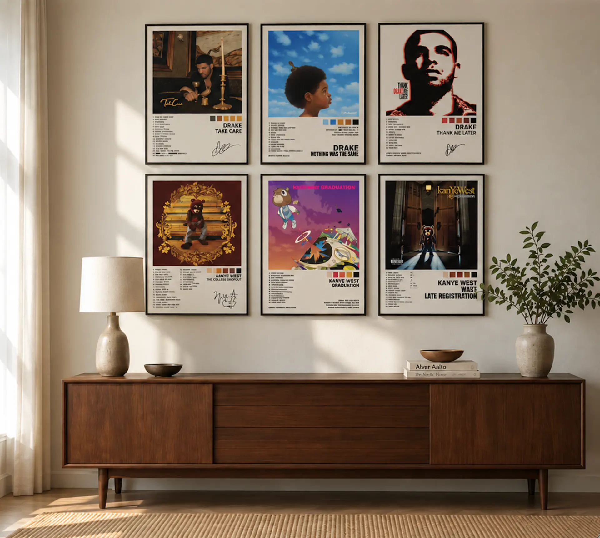 Six framed Drake and Kanye West prints above a walnut sideboard